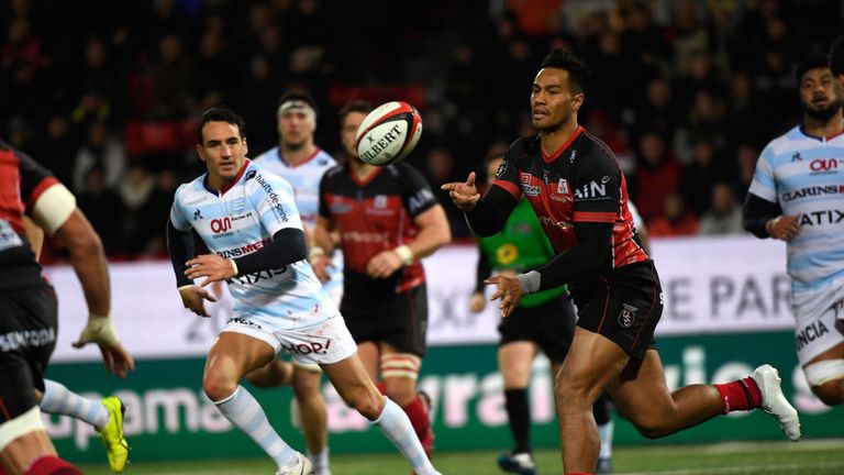 Oyonnax's Australian center Uj Seuteni passes the ball to his teammate during the French To