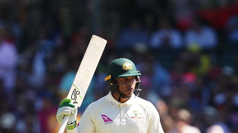 SYDNEY, AUSTRALIA - JANUARY 05:  Usman Khawaja of Australia acknowledges the crowd after scoring a half century during day two of the Fifth Test match in t