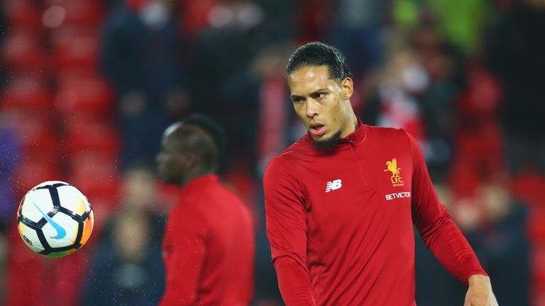LIVERPOOL, ENGLAND - JANUARY 05:  Virgil van Dijk of Liverpool warms up prior to the Emirates FA Cup Third Round match between Liverpool and Everton at Anf