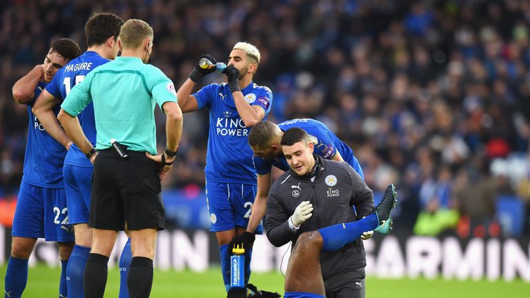 LEICESTER, ENGLAND - JANUARY 01: Wes Morgan of Leicester City receives treatment during the Premier League match between Leicester City and Huddersfield To