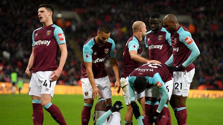LONDON, ENGLAND - JANUARY 04:  Pedro Obiang of West Ham United (grounded) celebrates with teammates after scoring his sides first goal during the Premier L