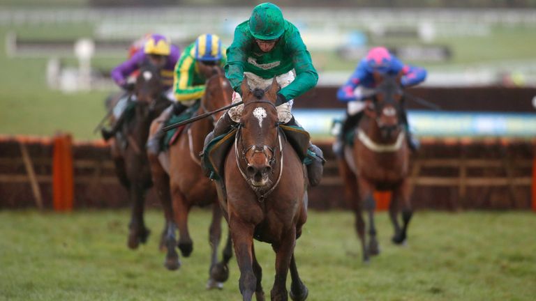 Wholestone and Daryl Jacob clear the last flight before going on to win the Dornan Engineering Relkeel Hurdle