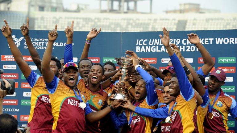 DHAKA, BANGLADESH - FEBRUARY 14:  Team West Indies celebrates with the ICC U19 World Cup trophy, West Indies won the Final Match between India and West Ind