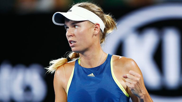 MELBOURNE, AUSTRALIA - JANUARY 23:  Caroline Wozniacki of Denmark celebrates winning the first set in her quarter-final match against Carla Suarez-Navarro 