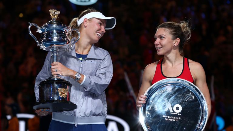 MELBOURNE, AUSTRALIA - JANUARY 27:  Caroline Wozniacki (L) of Denmark poses for a photo with the Daphne Akhurst Memorial Cup after winning the women's sing