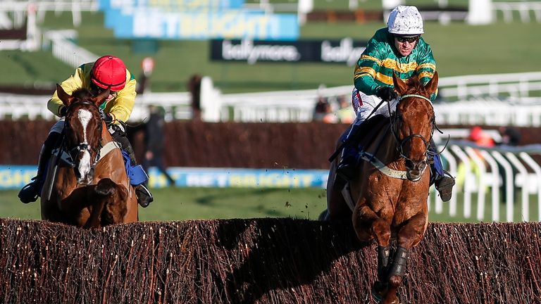 Barry Geraghty riding Yanworth (right) clear the last to win the BetBright Dipper Novice' Chase from Sizing Tennesse