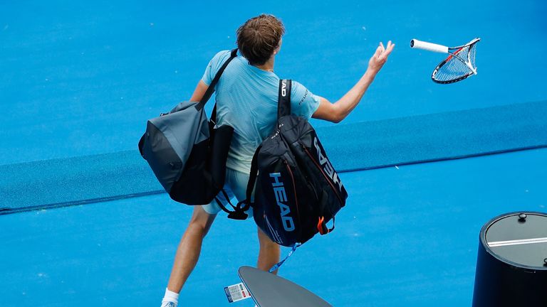 MELBOURNE, AUSTRALIA - JANUARY 20:  Alexander Zverev throws the racquet he smashed in frustration in the fifth set of his third round match against Hyeon C