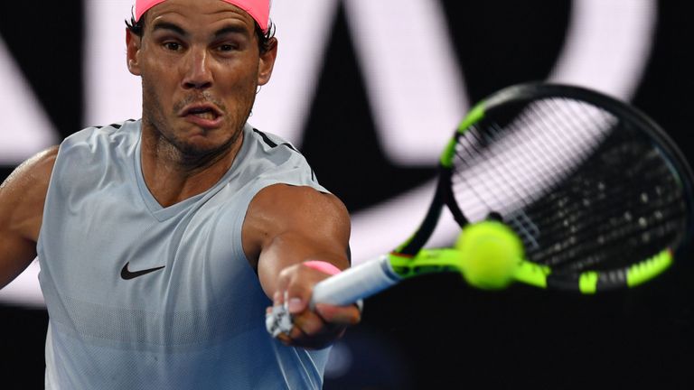 Spain's Rafael Nadal plays a forehand return to Croatia's Marin Cilic during their men's singles quarter-finals match on day nine of the Australian Open