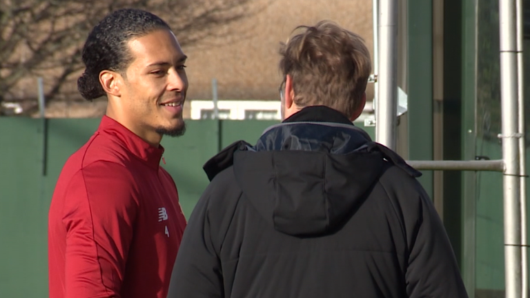 Virgil van Dijk (left) in discussion with manager Jurgen Klopp at Liverpool's training session on Wednesday