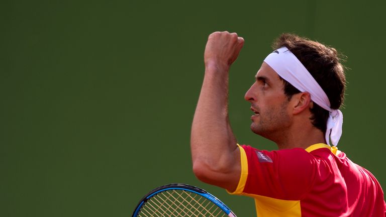 Spain's Albert Ramos celebrates a point against Britain´s Cameron Norrie during the first round of the Davis Cup tennis match between Spain and Great Brit