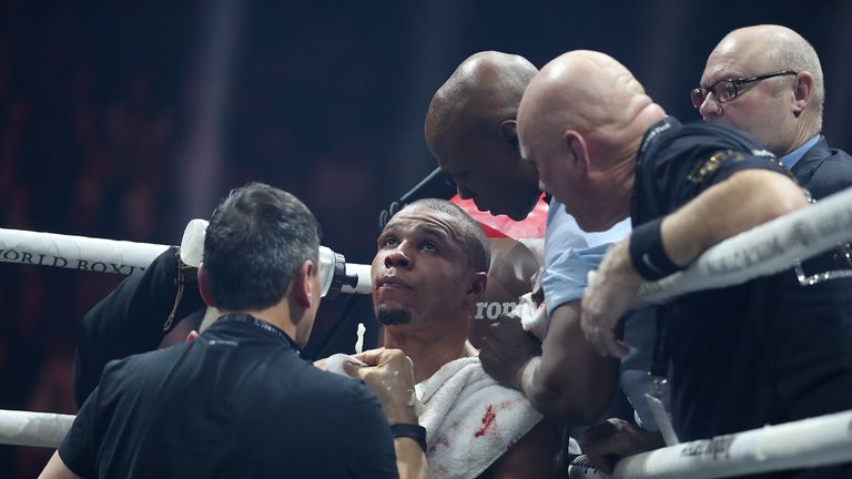 MANCHESTER, ENGLAND - FEBRUARY 17:  Chris Eubank JR of England speaks with his father Chris Eubank Snr between rounds during his WBSS Super Middleweight bo