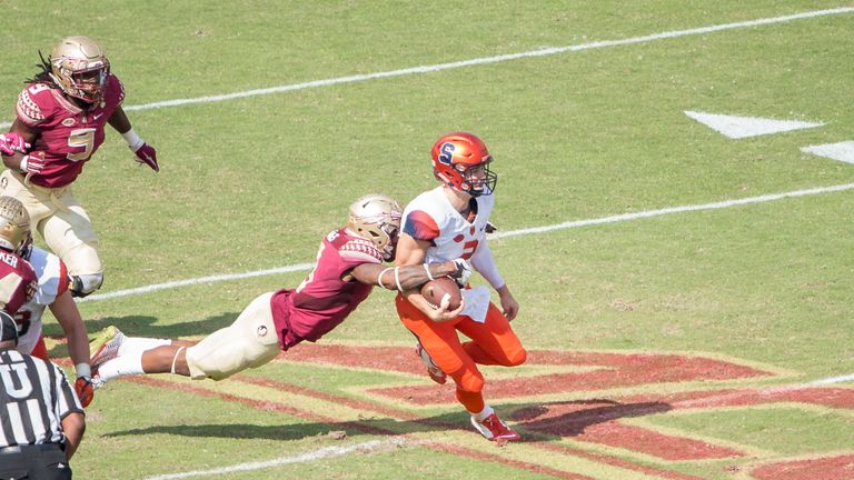 TALLAHASSEE, FL - OCTOBER 31: Defensive back Derwin James #3 of the Florida State Seminoles attempts to sack quarterback Eric Dungey #2 of the Syracuse Ora