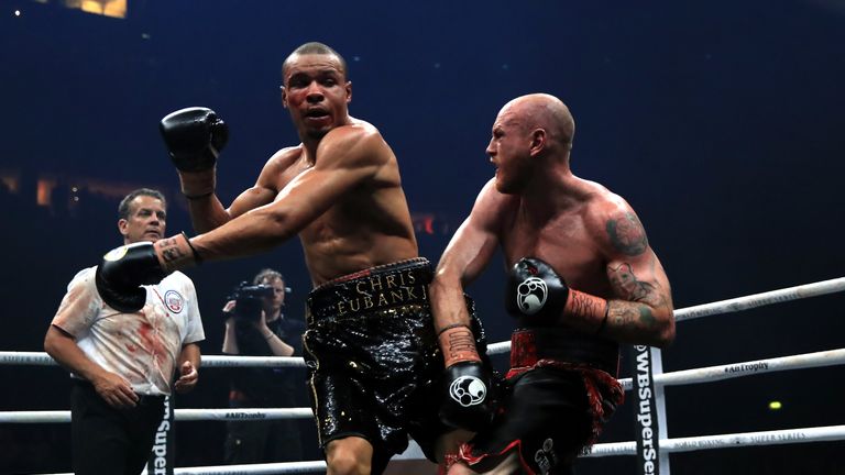 Chris Eubank (left) and George Groves (right) during the WBA Super-Middleweight title fight at the Manchester Arena.