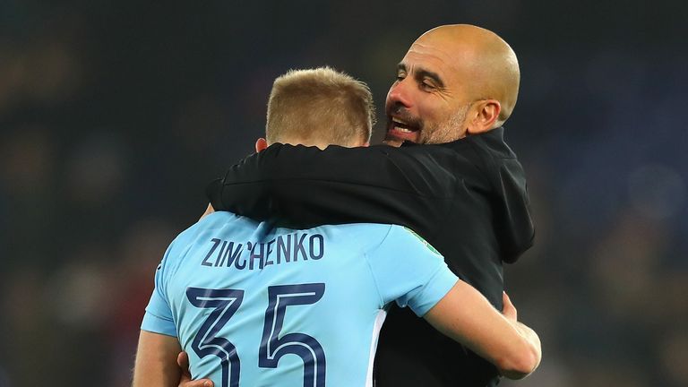 Oleksandr Zinchenko and Pep Guardiola of Manchester City celebrate penalty shootout victory over Leicester in the Carabao Cup