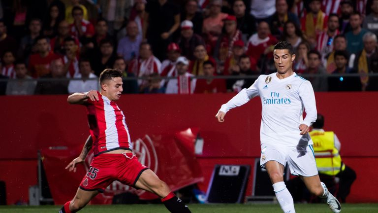 Cristiano Ronaldo of Real Madrid fights for the ball with Pablo Maffeo of Girona during the La Liga match in October 2017