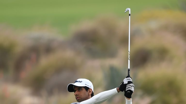 DOHA, QATAR - FEBRUARY 22:  Aaron Rai of England hits an approach shot on the 5th hole during the first round of the Commercial Bank Qatar Masters at Doha 