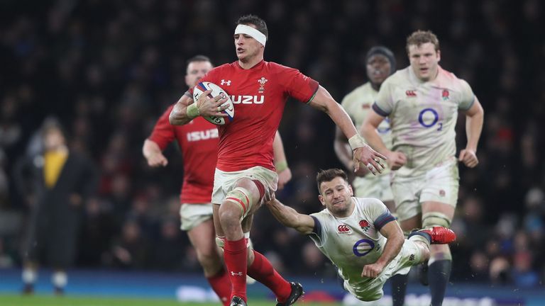 LONDON, ENGLAND - FEBRUARY 10:  Aaron Shingler of Wales is tackled by Sam Simmonds of England during the NatWest Six Nations round two match between Englan