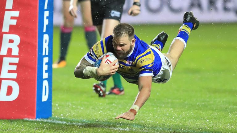 Leeds Rhinos' Adam Cuthbertson dives in to score his sides first try during the Betfred Super League match at Elland Road.