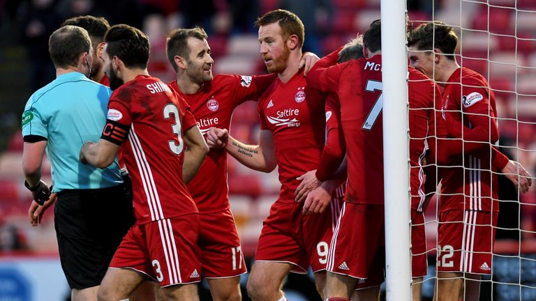 Aberdeen's Adam Rooney (9) celebrates his goal with team-mates