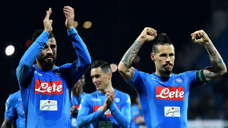 Napoli's Spanish defender Raul Albiol (L) and Napoli's Slovakian midfielder Marek Hamsik celebrate at the end of the Italian Serie A football match Cagliar