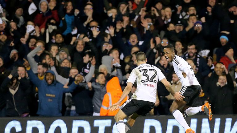Fulham's Aleksandar Mitrovic celebrates scoring his sides second goal with Ryan Sessegnon