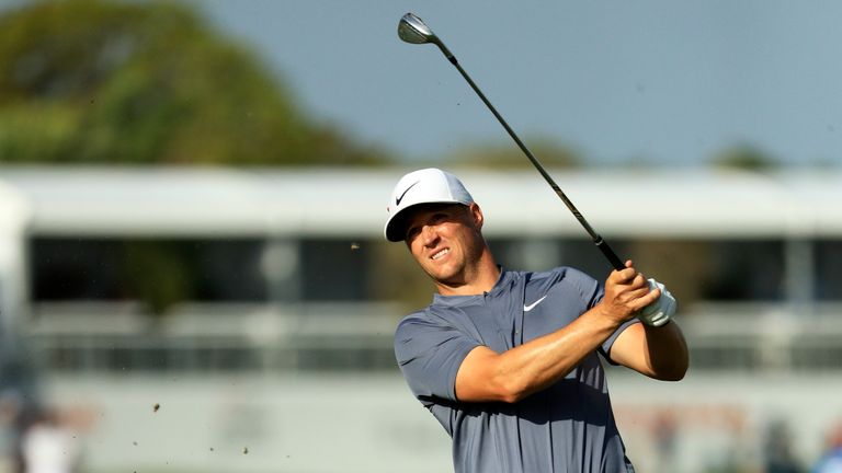 PALM BEACH GARDENS, FL - FEBRUARY 22: Alex Noren of Sweden hits his approach shot on the 13th hole during the first round of the Honda Classic at PGA Natio