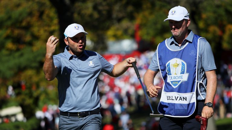 CHASKA, MN - OCTOBER 02:  Andy Sullivan of Europe reacts with his caddie Sean McDonagh on the third green during singles matches of the 2016 Ryder Cup at H