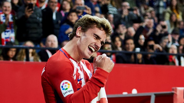 SEVILLE, SPAIN - FEBRUARY 25:  Antoine Griezmann of Atletico Madrid celebrates after scoring his team's second goal during the La Liga match between Sevill
