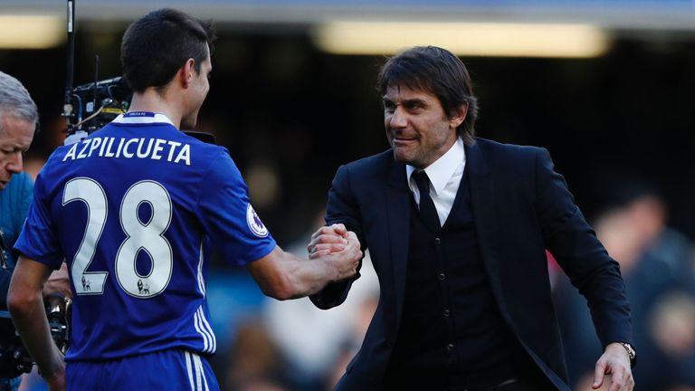 Chelsea head coach Antonio Conte with Cesar Azpilicueta (L)