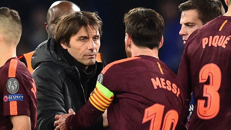 Barcelona's Argentinian striker Lionel Messi shakes hands with Chelsea's Italian head coach Antonio Conte (2nd L) after the first leg of the UEFA Champions