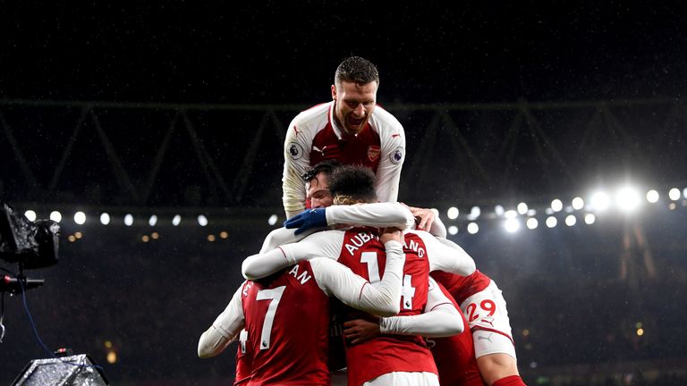 LONDON, ENGLAND - FEBRUARY 03:  Pierre-Emerick Aubameyang of Arsenal celebrates after scoring his sides fourth goal with teammates during the Premier Leagu