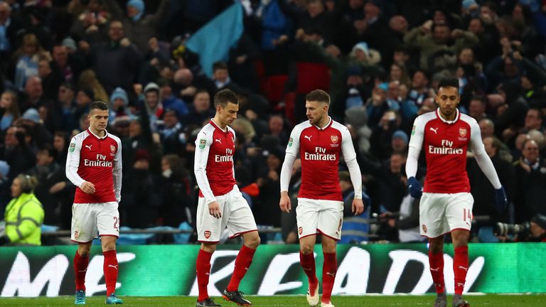 LONDON, ENGLAND - FEBRUARY 25:  Granit Xhaka, Laurent Koscielny, Aaron Ramsey and Pierre-Emerick Aubameyang of Arsenal look dejected during the Carabao Cup