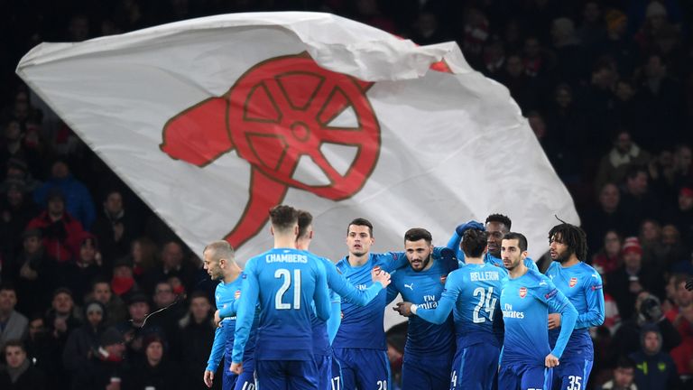 LONDON, ENGLAND - FEBRUARY 22:  Sead Kolasinac of Arsenal celebrates scoring the first Arsenal goal with team mates during UEFA Europa League Round of 32 m