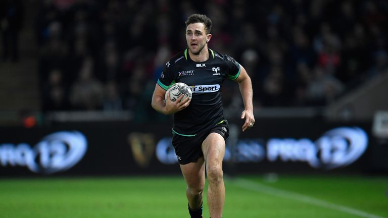 SWANSEA, WALES - DECEMBER 27:  Ospreys centre Ashley Beck in action during the Guinness Pro 12 match between Ospreys and Scarlets at Liberty Stadium on Dec