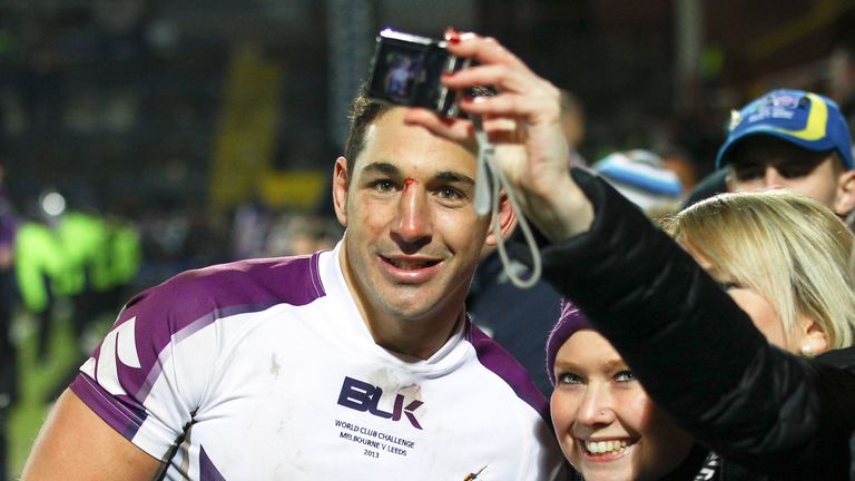Billy Slater poses for photos with fans after Melbourne Storm v Leeds in World Club Challenge 2013