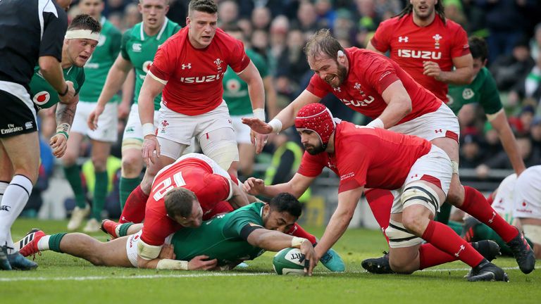Bundee Aki places the ball over the try-line for Ireland's second try 
