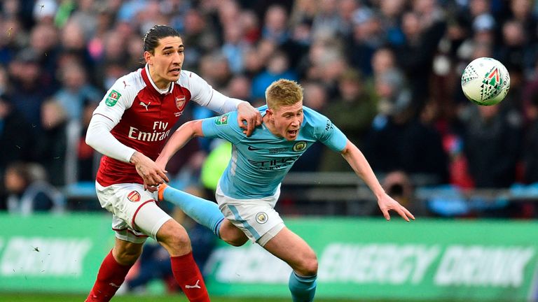 Kevin De Bruyne is challenged by Hector Bellerin
