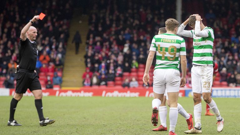 Celtic's Mikael Lustig is sent off during the game at Aberdeen