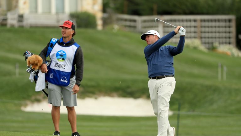 PEBBLE BEACH, CA - FEBRUARY 11:  Chez Reavie plays his shot on the 13th hole during the Final Round of the AT&T Pebble Beach Pro-Am at Pebble Beach Golf Li