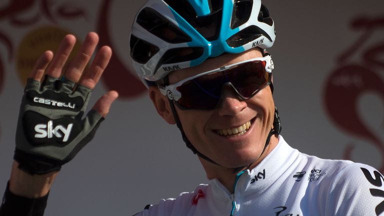 Team Sky's British cyclist Christopher Froome waves to supporters prior to the first stage of the "Ruta del Sol" tour, a 197,6 km ride from Mijas to Granad
