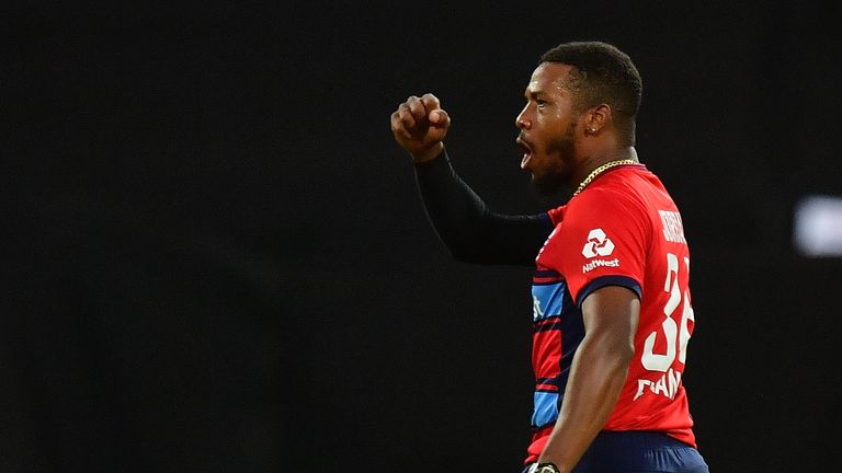 England's Chris Jordan celebrates after bowling out New Zealand's Kane Williamson during the first Twenty20 cricket match between New Zealand and England a