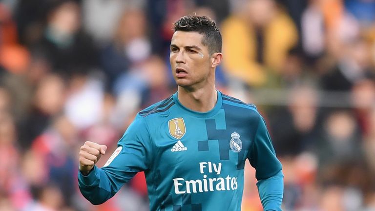 Cristiano Ronaldo of Real Madrid celebrates scoring his side's second goal from the penalty spot during the La Liga match v Valencia