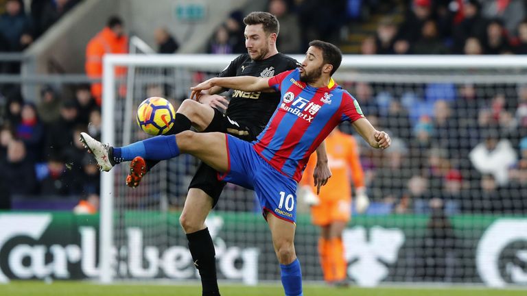 Paul Dummett (L) vies with Andros Townsend during the Premier League football match, Crystal Palace v Newcastle