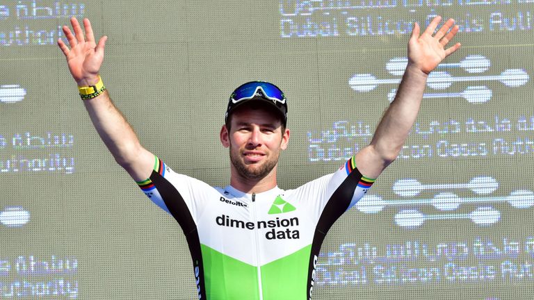 Dimension Data's British rider Mark Cavendish celebrates on the podium after his victory in the third stage of the Dubai Tour