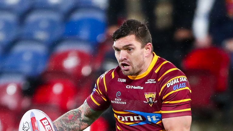 Huddersfield's Danny Brough on the attack against Warrington