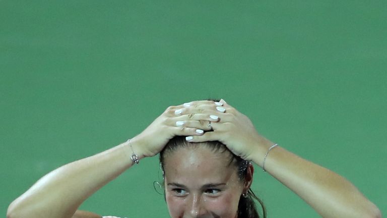 Daria Kasatkina of Russia reacts after conceding to Garbine Muguruza of Spain during their semi-final match at the WTA Dubai Duty Free Tennis Championship 