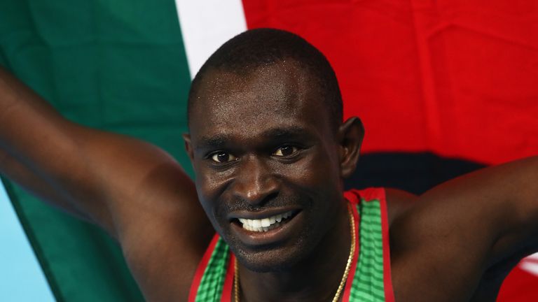 RIO DE JANEIRO, BRAZIL - AUGUST 15:  David Lekuta Rudisha of Kenya celebrates with the flag of Kenya after winning the gold medal in the Men's 800m Final o