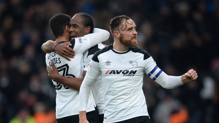 DERBY, ENGLAND - FEBRUARY 03: Cameron Jerome of Derby County celebrates with his team mates, Curtis Davies (L) and Richard Keogh (R) after he scores the se