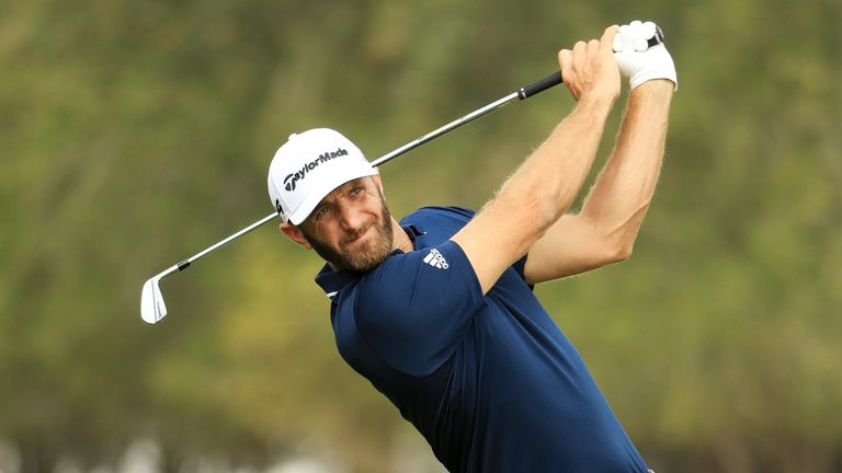 ABU DHABI, UNITED ARAB EMIRATES - JANUARY 21:  Dustin Johnson of the United States plays his second shot on the second hole during the final round of the A