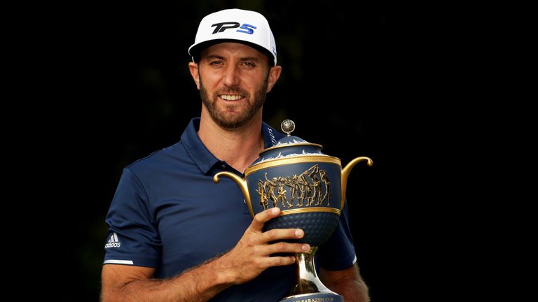 MEXICO CITY, MEXICO - MARCH 05:  Dustin Johnson of the United States posese with his trophy after winning the World Golf Championships Mexico Championship 